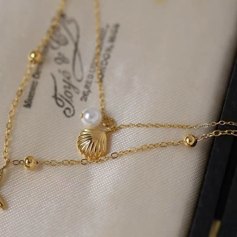 Collier empilable en or avec coquillage étoile de mer à double couche