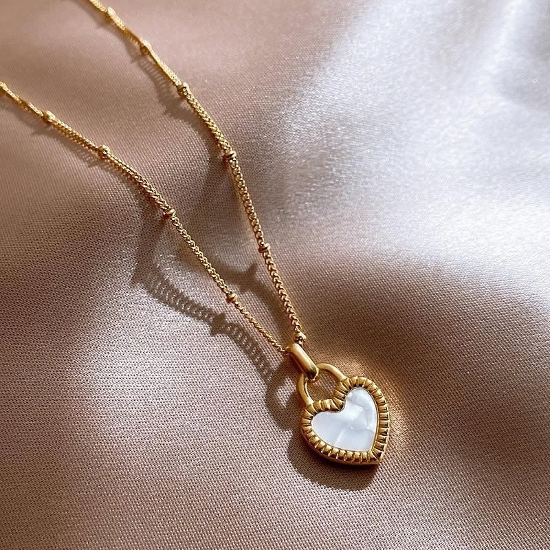 Collar de corazón de doble cara a la moda