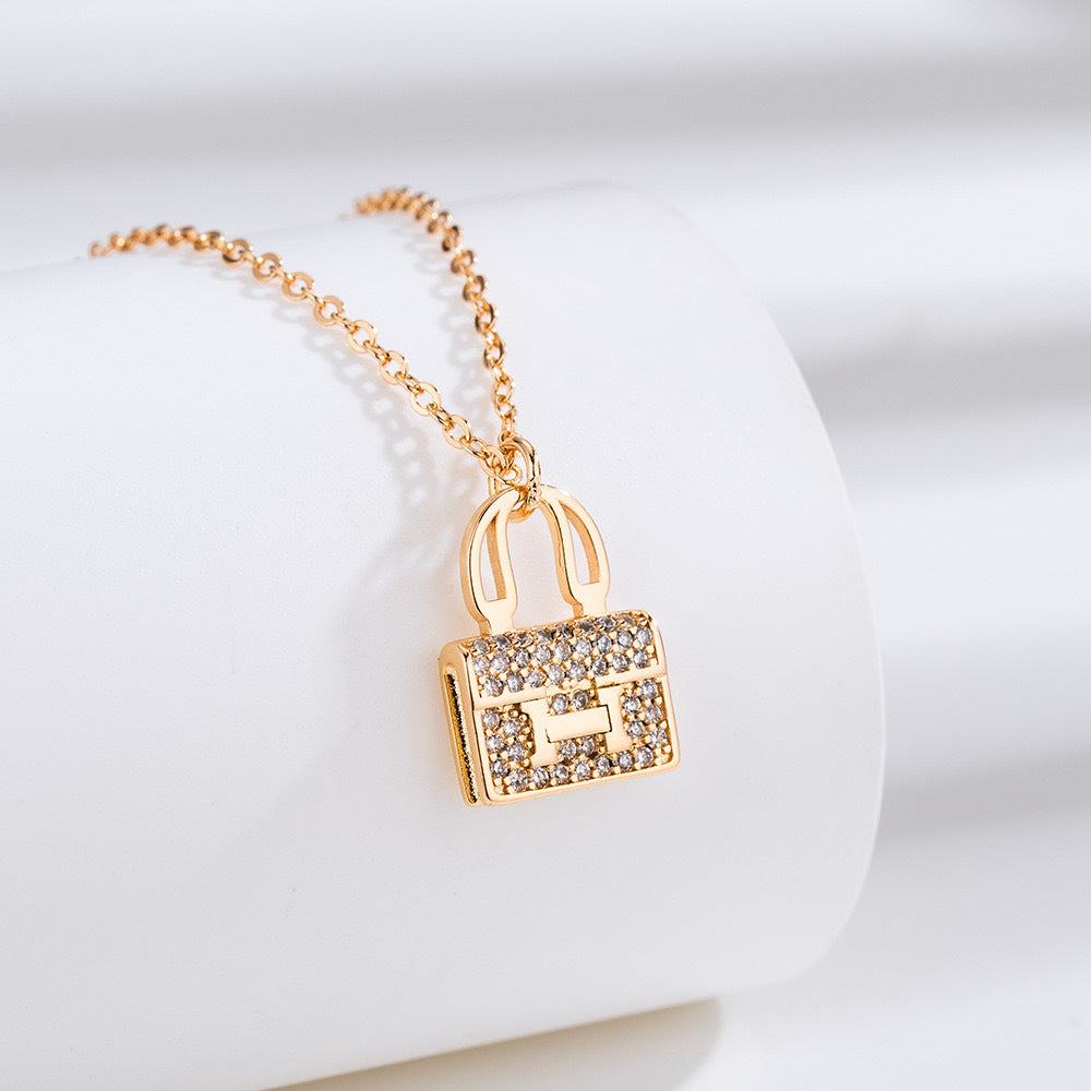 Gleam Purse Pendant Necklace