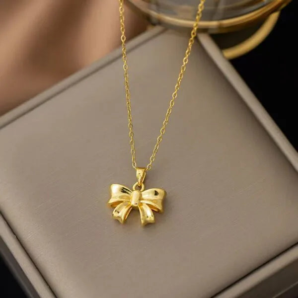 Collar de plata de ley 925 con lazo y lirio de los valles