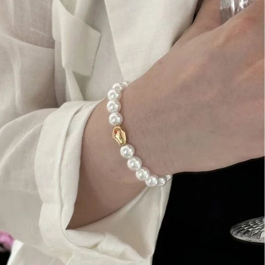 Pulsera de imitación de perlas blancas australianas de cuerda elástica