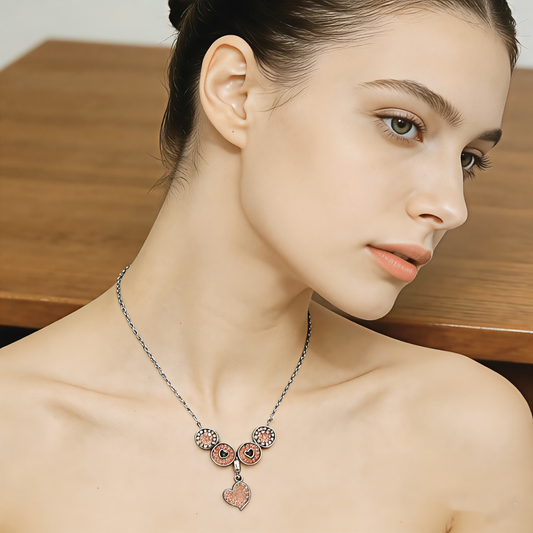 Collar con dije de órbita rosa