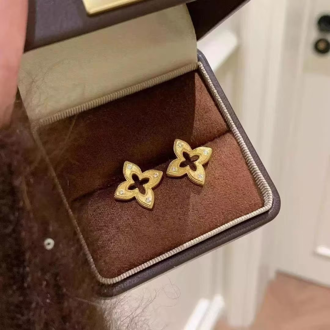 Aretes de plata esterlina 925 de lujo con flor de cuatro pétalos