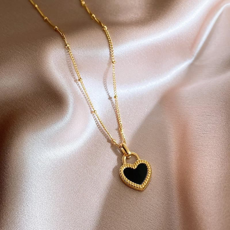 Collar de corazón de doble cara a la moda