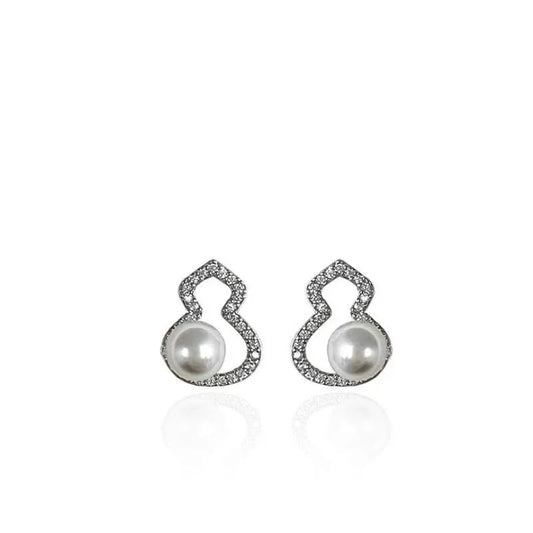 Pendientes de tuerca minimalistas con perlas y calabaza