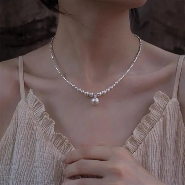 Collar de textura de plata machacada con perla sintética de plata 999