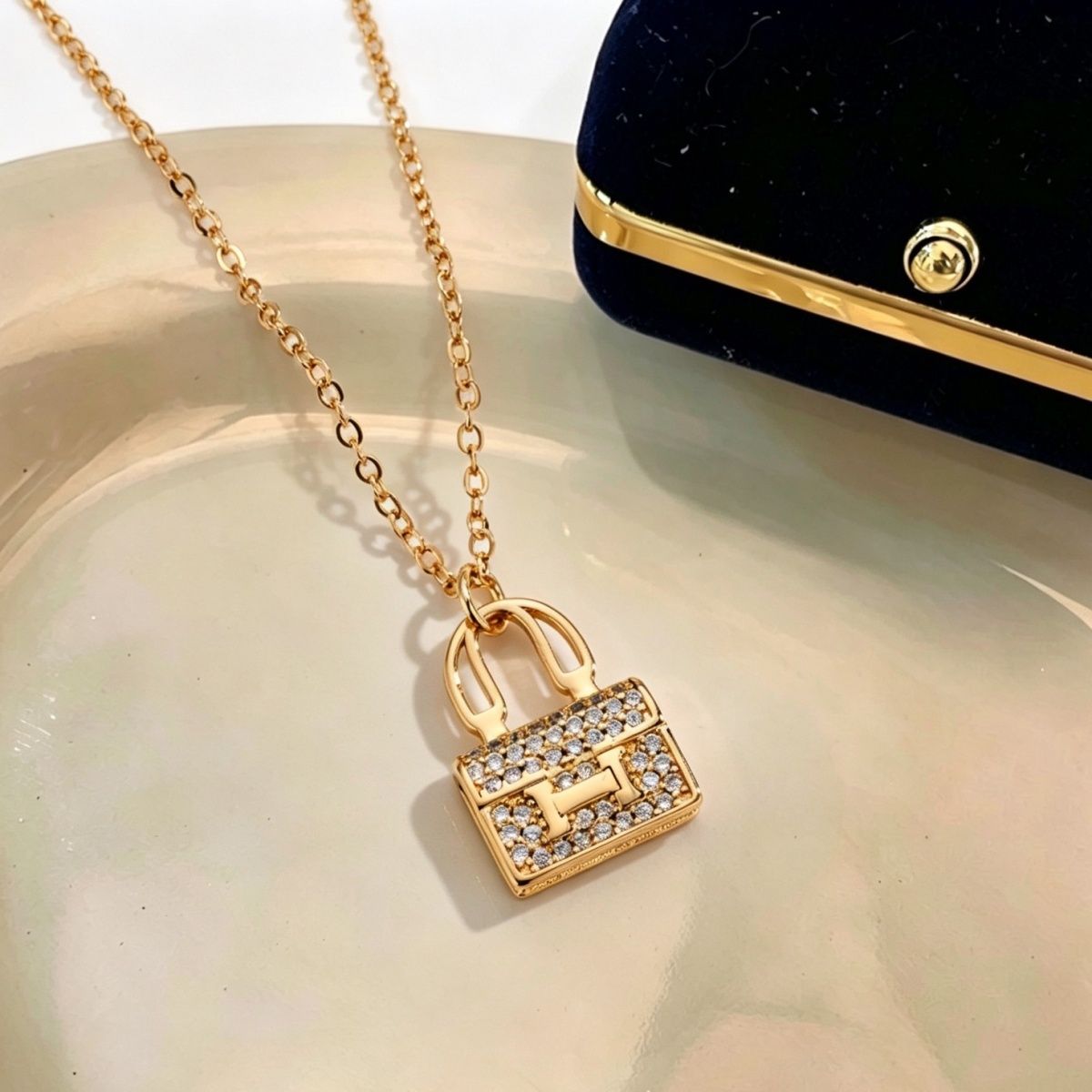 Gleam Purse Pendant Necklace