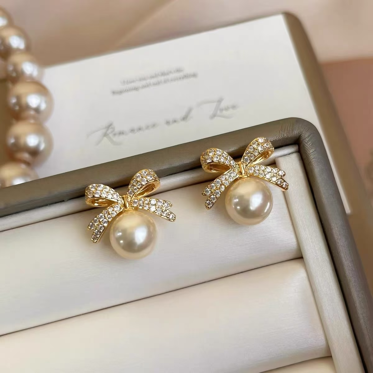 Sparkling Bow Whisper Earrings