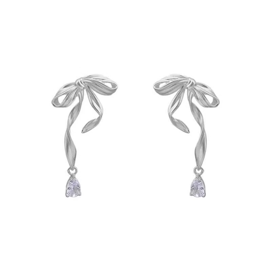Pendientes de lazo con gotas de cristal blanco
