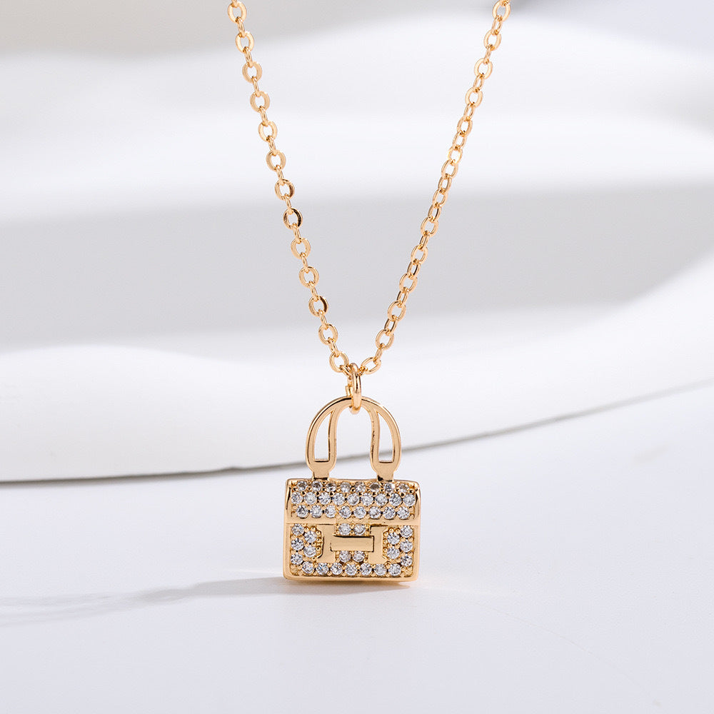 Gleam Purse Pendant Necklace