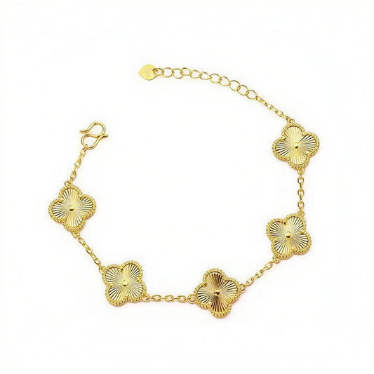 Pulsera de oro de cinco flores