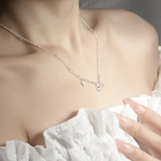 Collar de circonita de plata de ley 925 con concha y estrella de mar