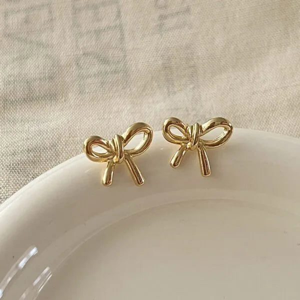 Large Bow Cut‑out Earrings