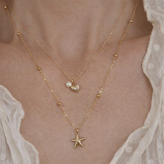 Collar apilable dorado de doble capa con conchas de estrellas de mar