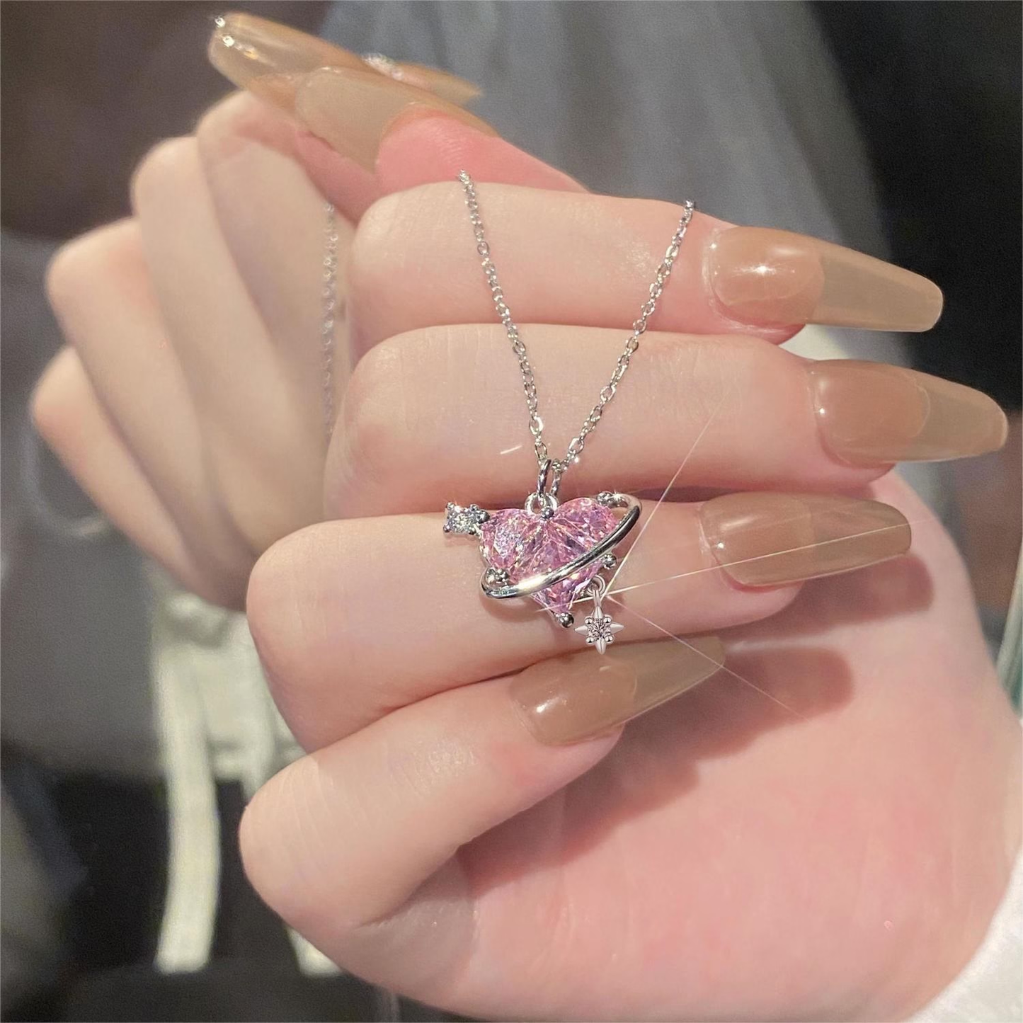 Collier en acier titane cœur en diamant rose