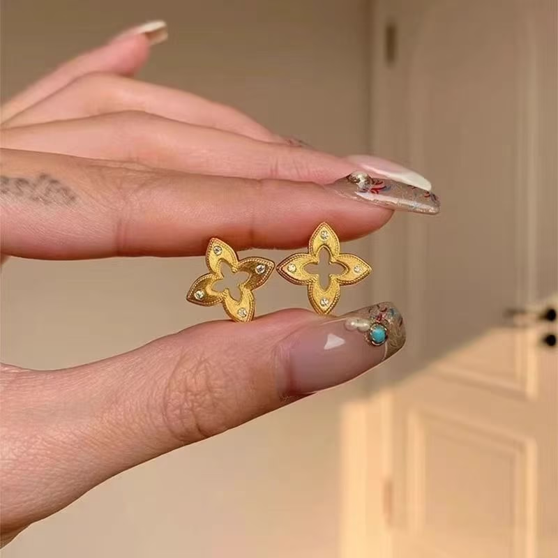 Aretes de plata esterlina 925 de lujo con flor de cuatro pétalos