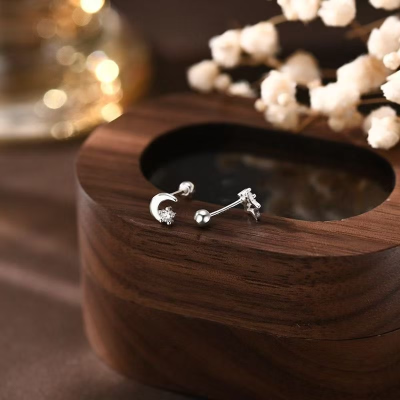 Boucles d'oreilles en argent 999 en forme de lune et d'étoile