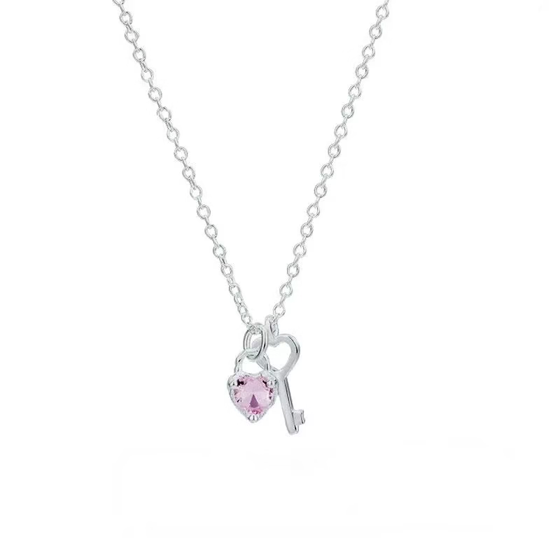 Collar de Corazón y Llave de Acero de Titanio con Circones
