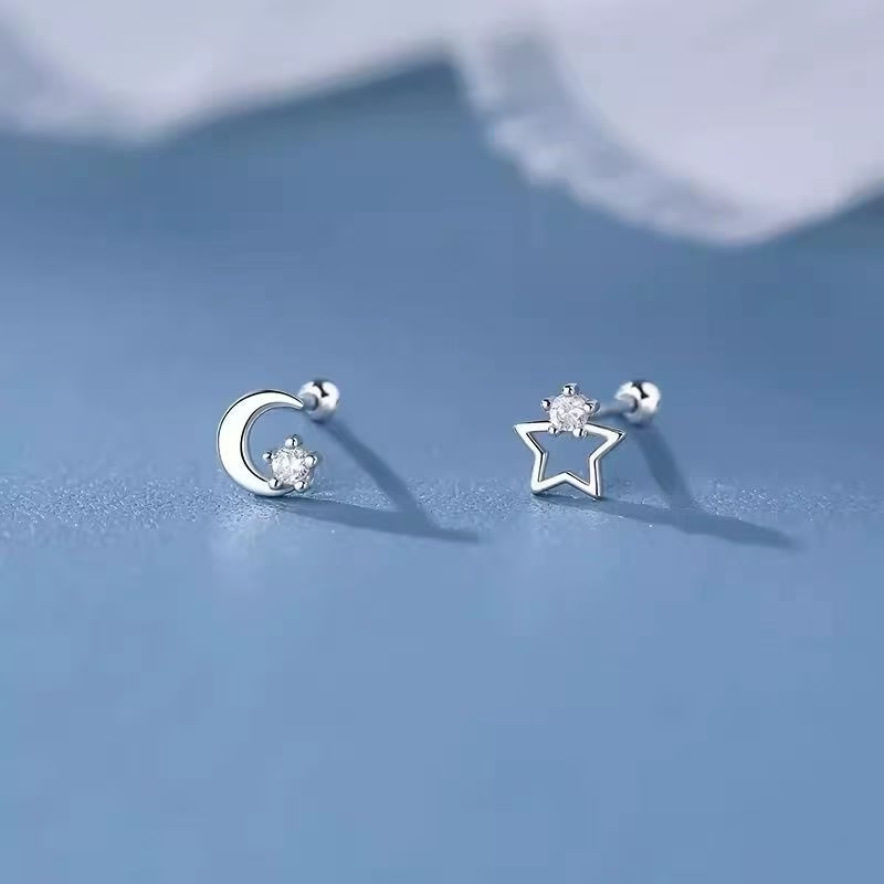 Boucles d'oreilles en argent 999 en forme de lune et d'étoile
