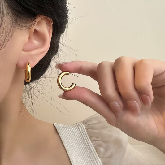 Pendientes redondos grandes chapados en acero inoxidable
